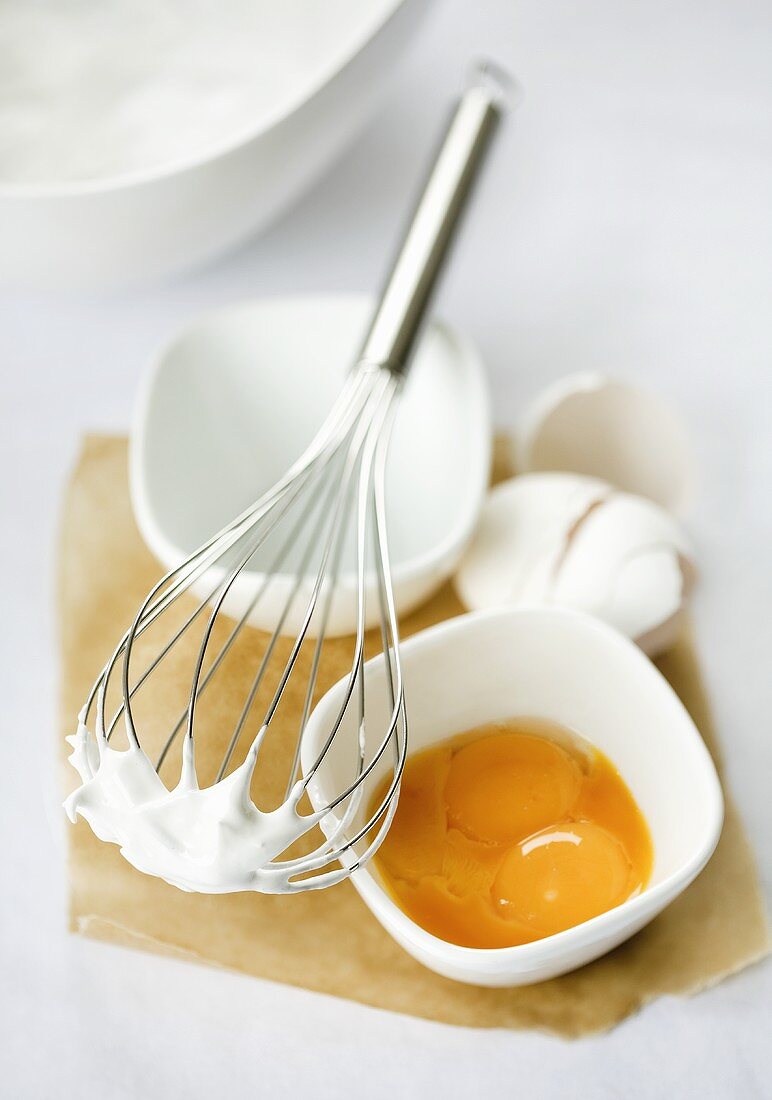 Baking ingredients (egg yolk and beaten egg white)