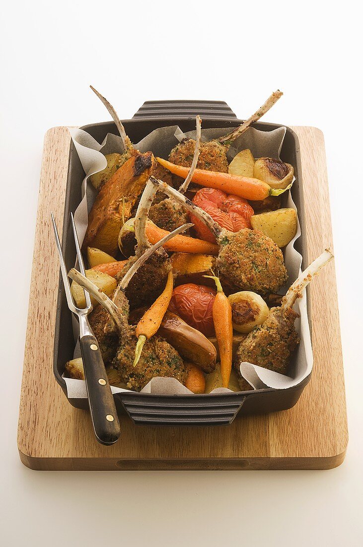 Lamb chops with a herb crust and vegetables