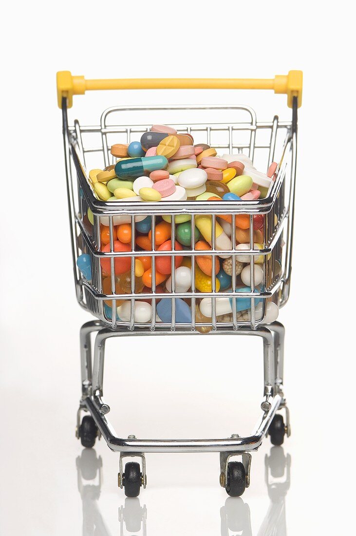 A shopping trolley filled with vitamin tablets