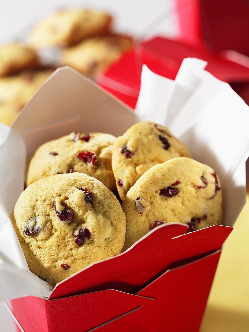 Orange and cranberry cookies in a take-away box