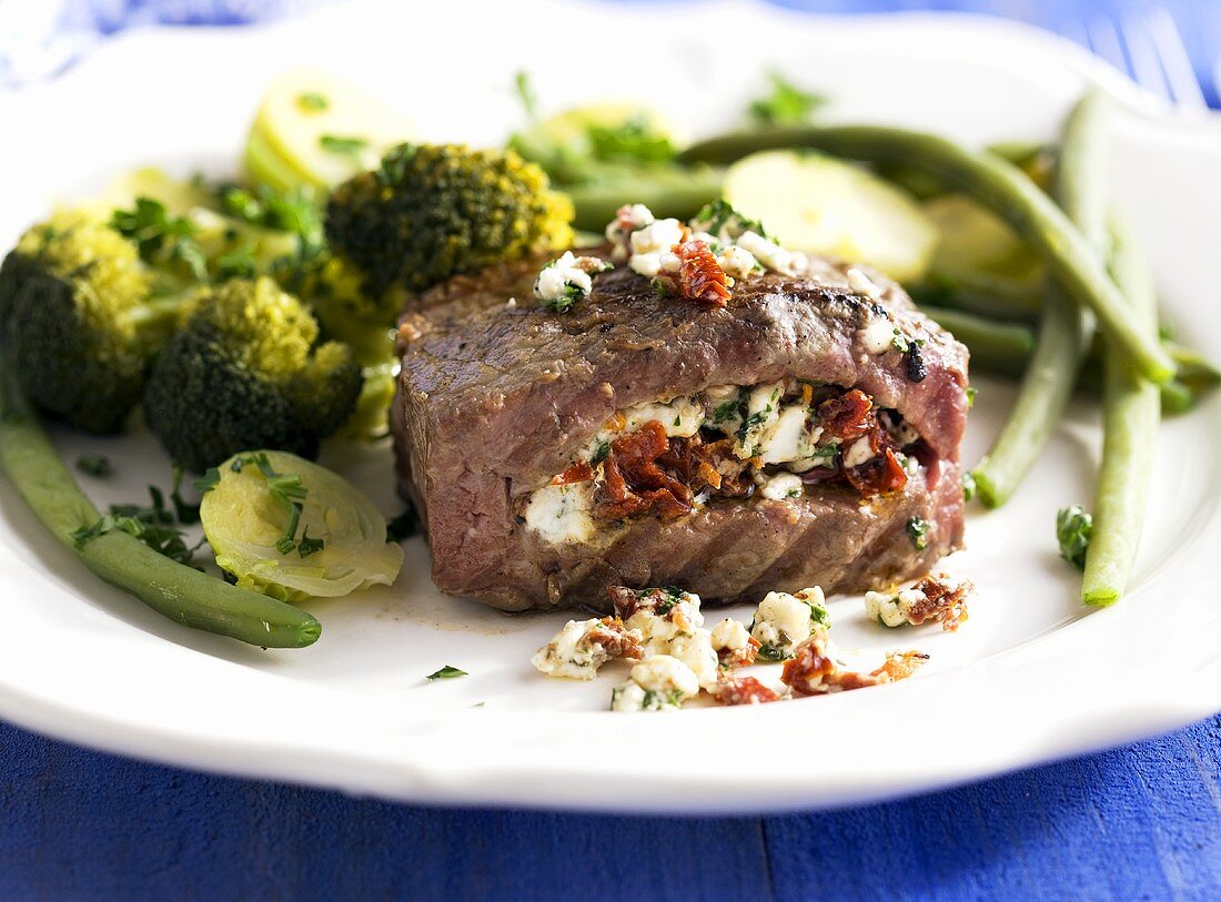Stuffed beef medallions with feta and dried tomatoes