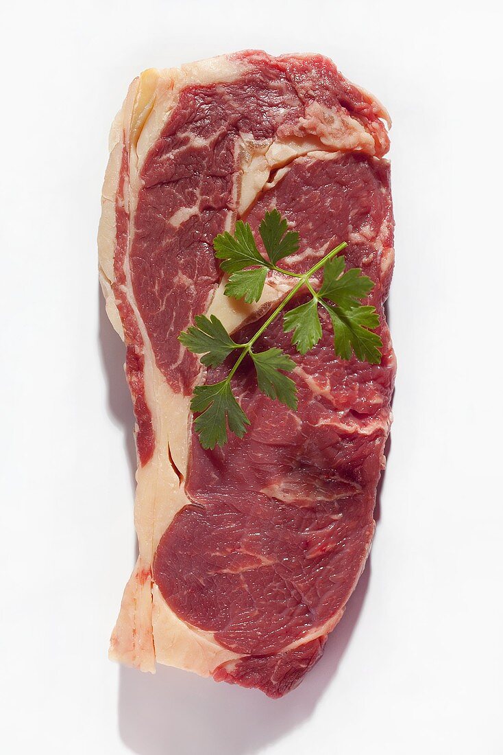 A raw ribeye steak