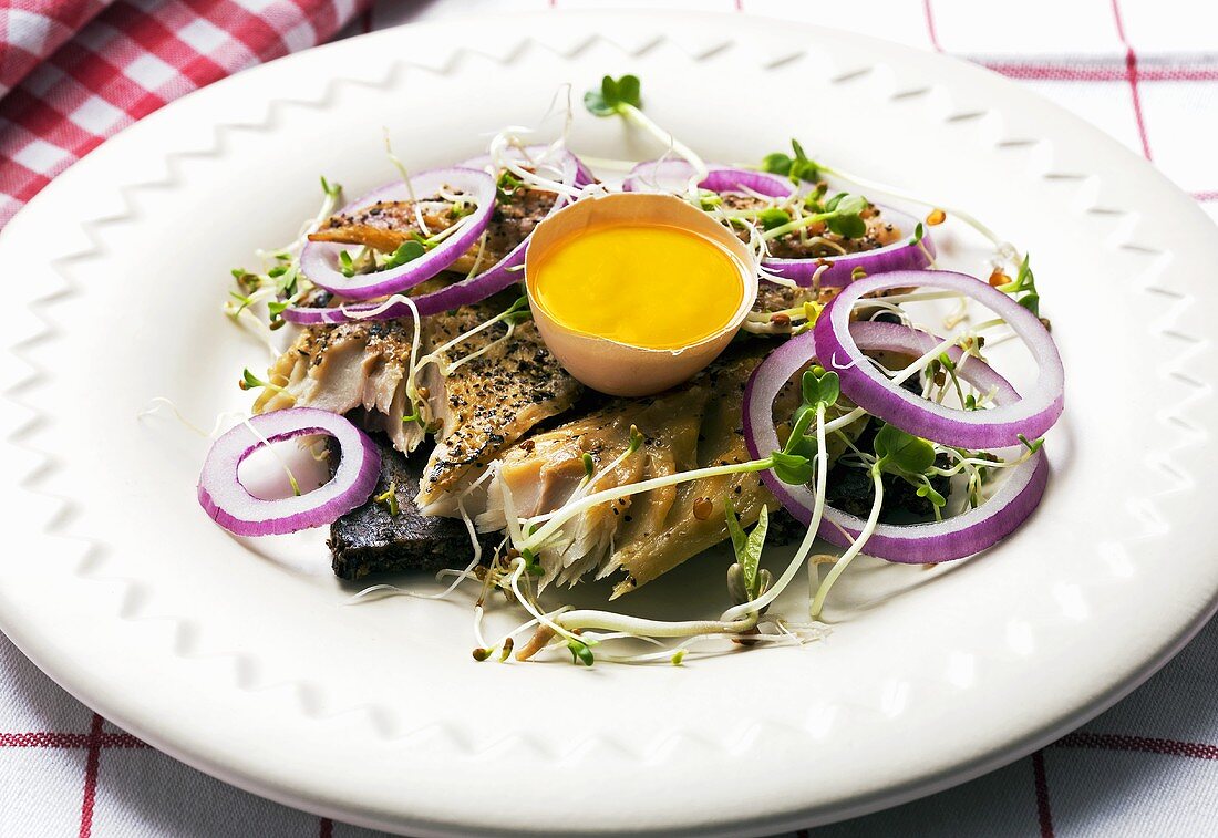 Mackerel sandwich with a raw egg yolk