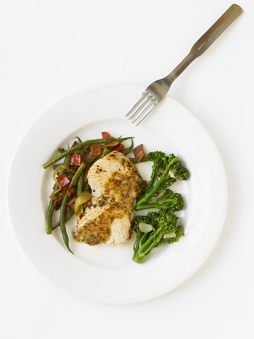 Mustard Turkey with Green Beans and Broccoli; White Plate; From Above