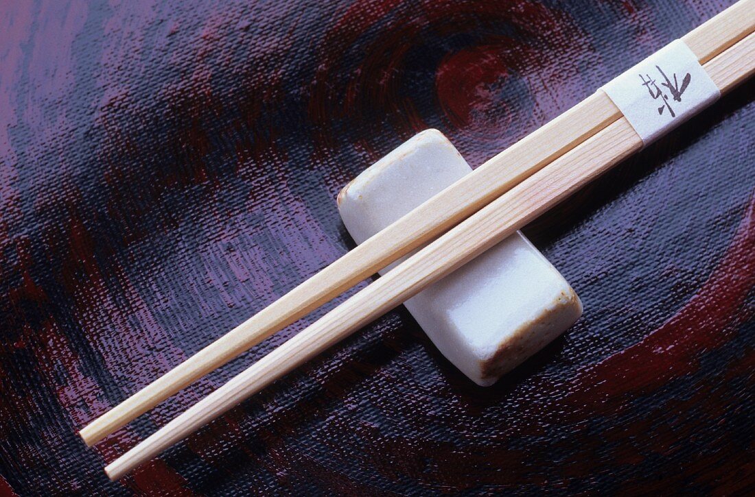 Wooden chopsticks with a chopstick rest