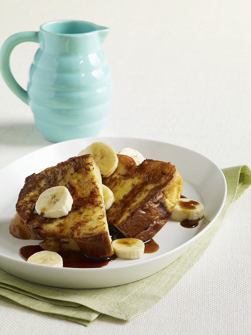 French Toast with Banana Slices and Maple Syrup