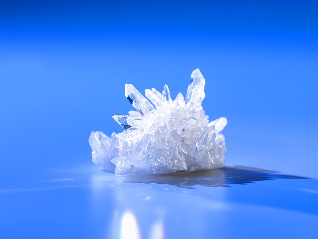 A mountain crystal on a blue background