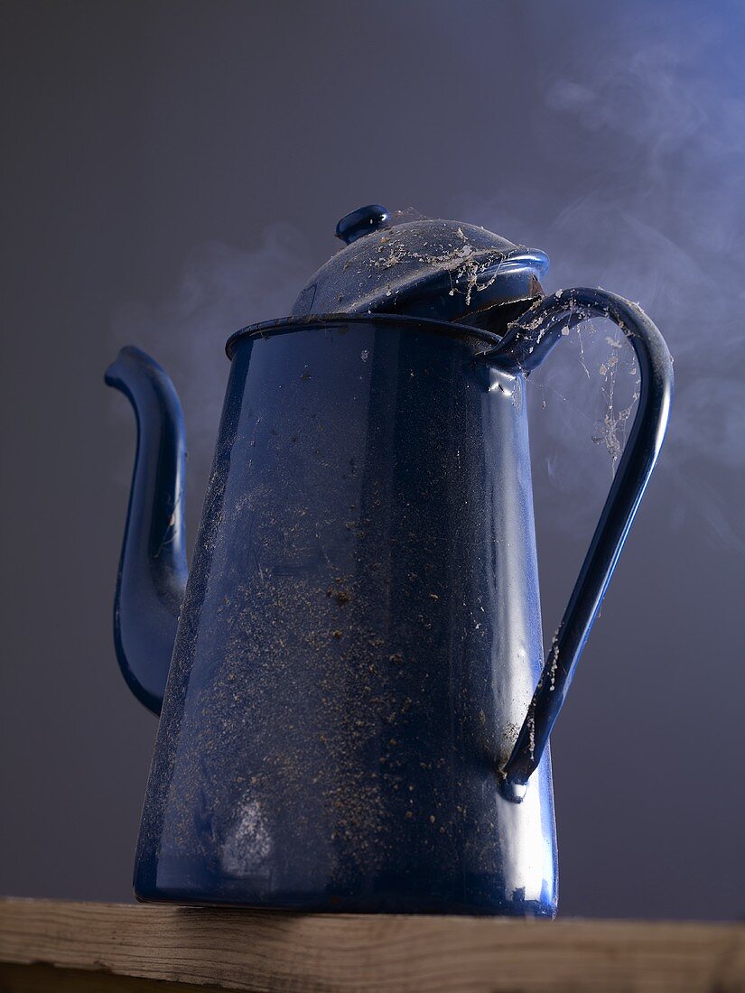 An old coffee pot steaming