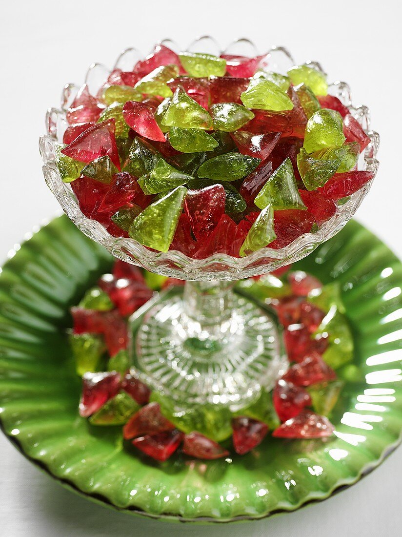 Red and green sweets in a glass bowl