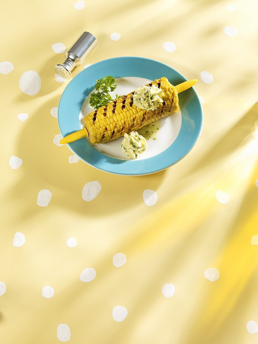 Grilled corn on the cob with herb butter