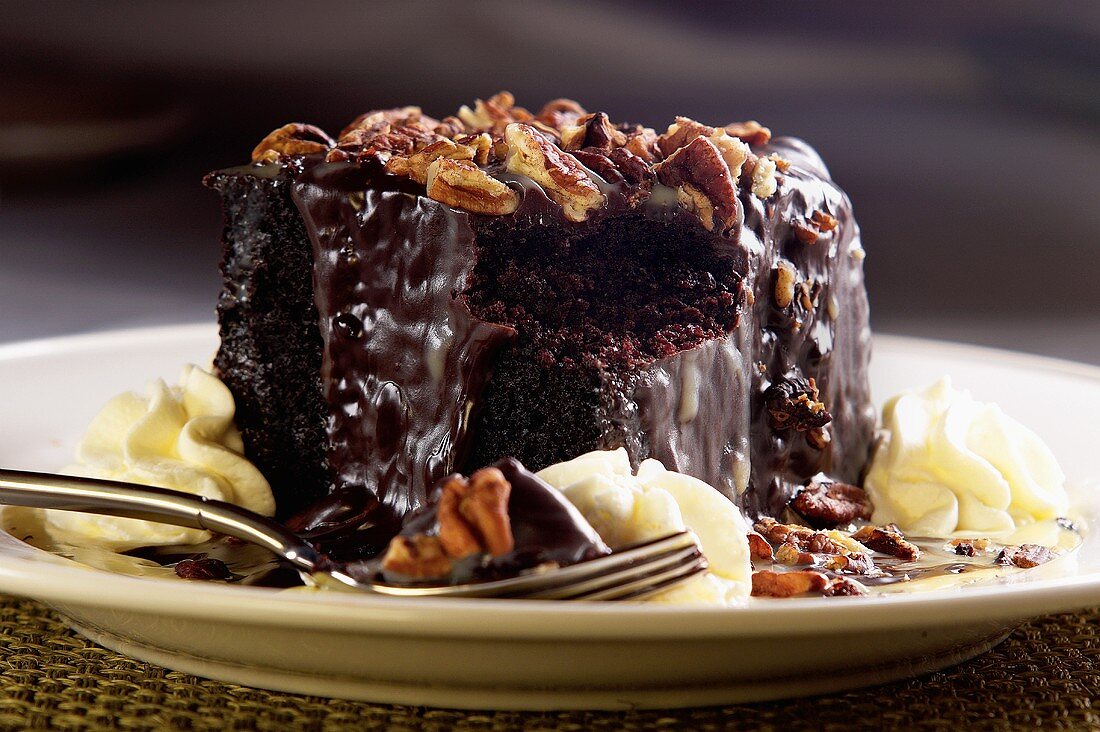 Individual Chocolate Cake with Whipped Cream and Walnuts