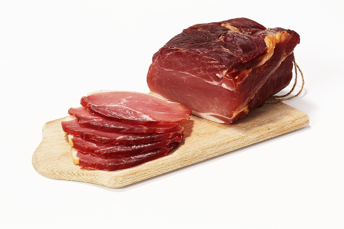 Cured pork loin on a cutting board