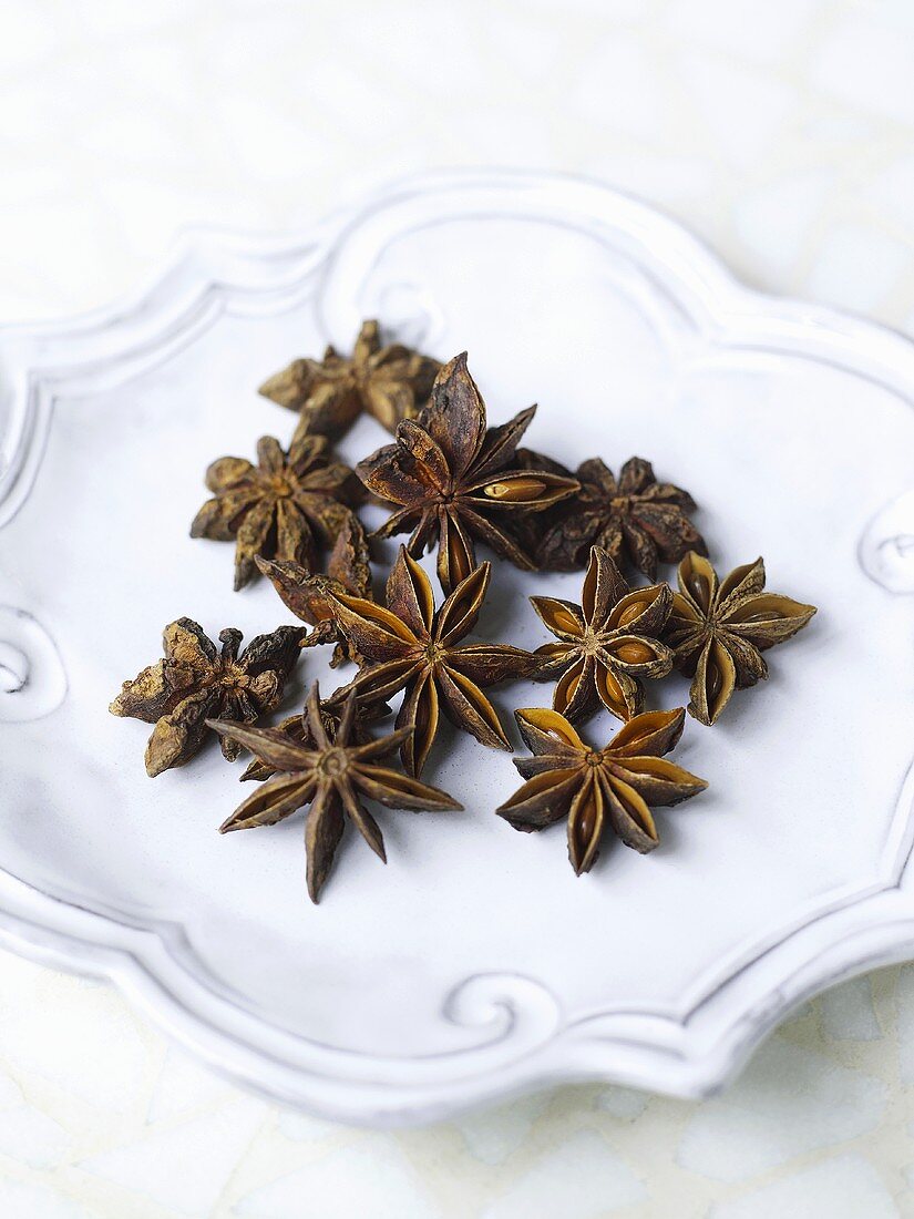 Star anise on a white surface