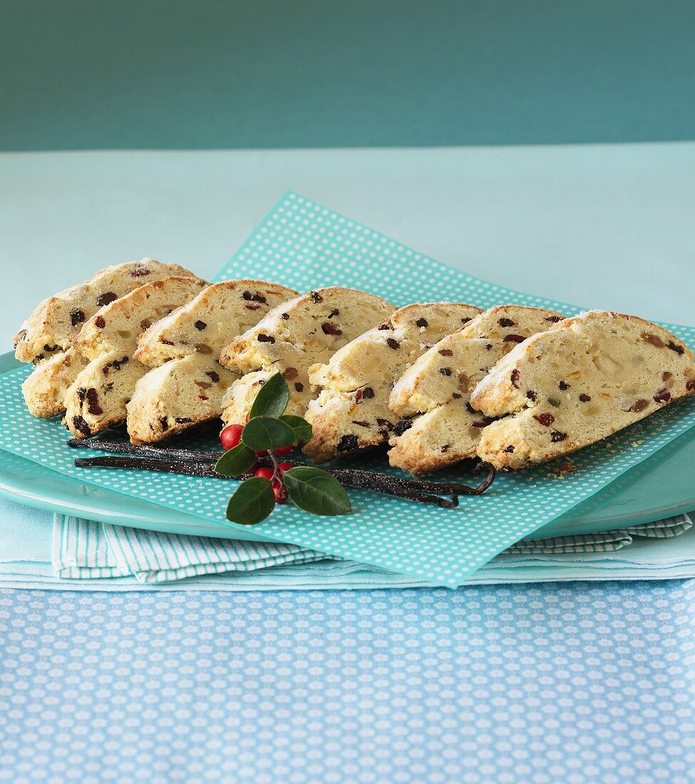 Sliced Stollen on a blue and white polka dotted serviette