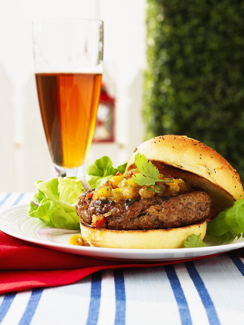 Curried lamb burger with mango chutney and beer