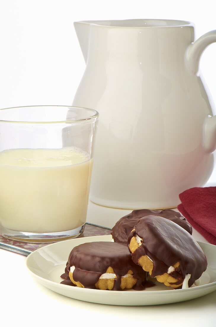 Moon Pies on a Plate with a Glass of Milk; Pitcher