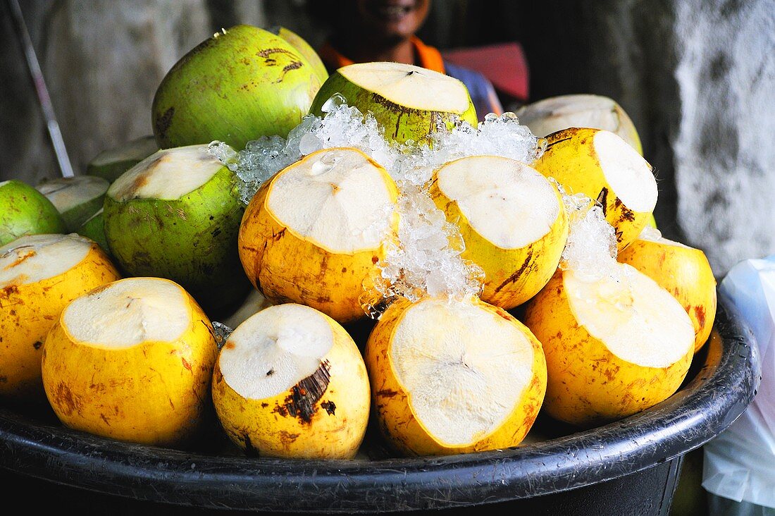 Young coconuts on ice, ready-to-drink