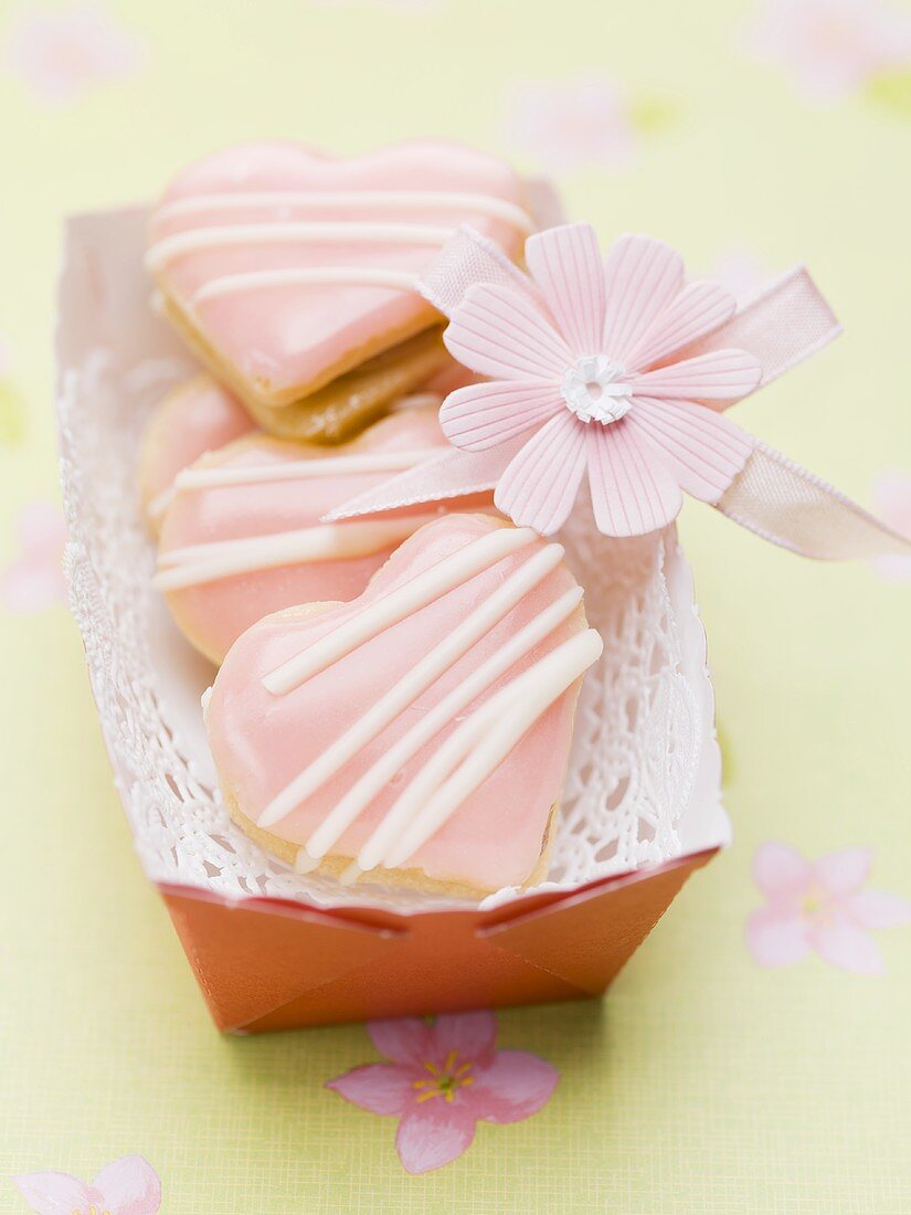 Pink heart biscuits filled with jam as a gift