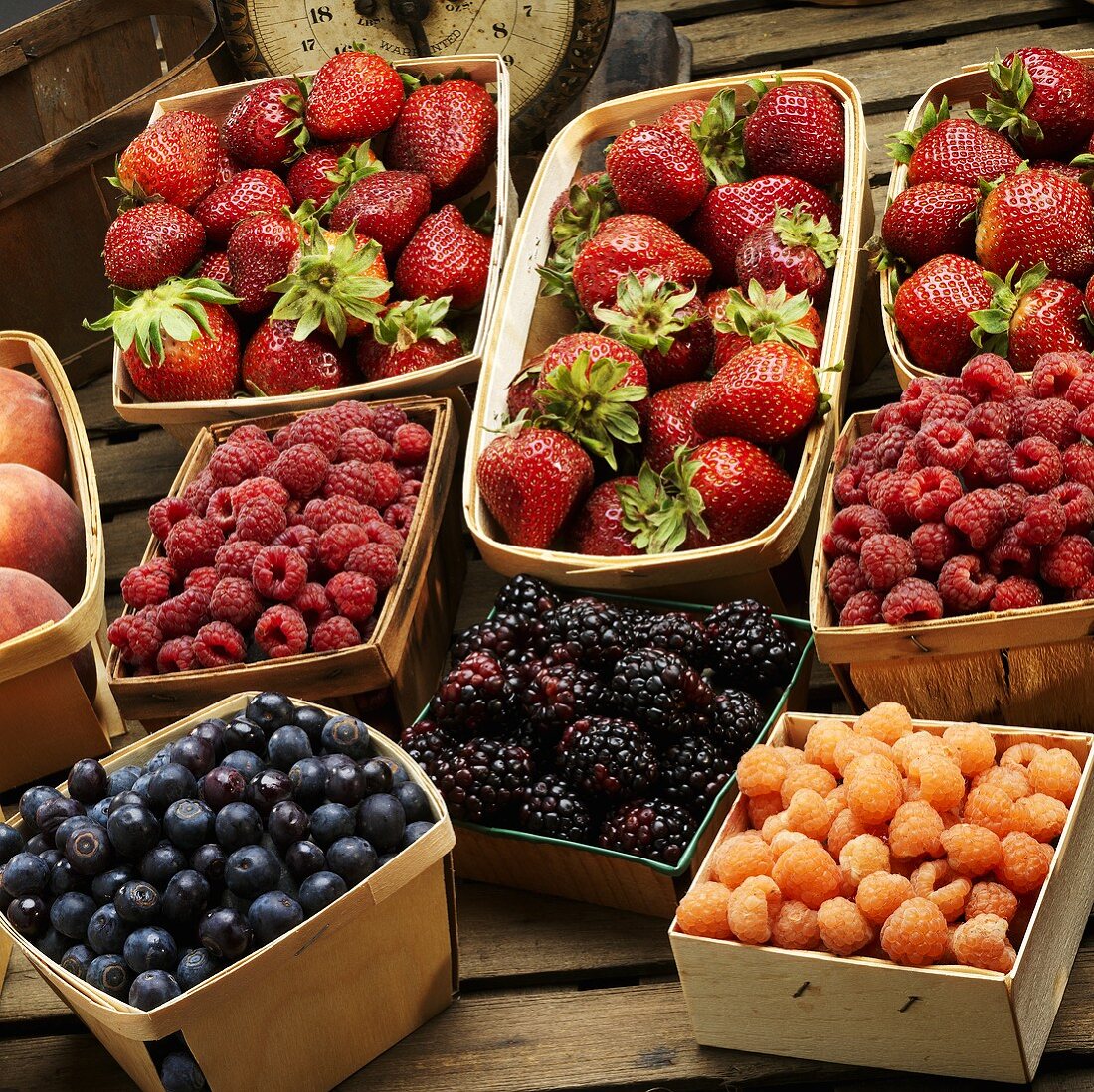 Many Baskets of Fresh Assorted Berries; Scale