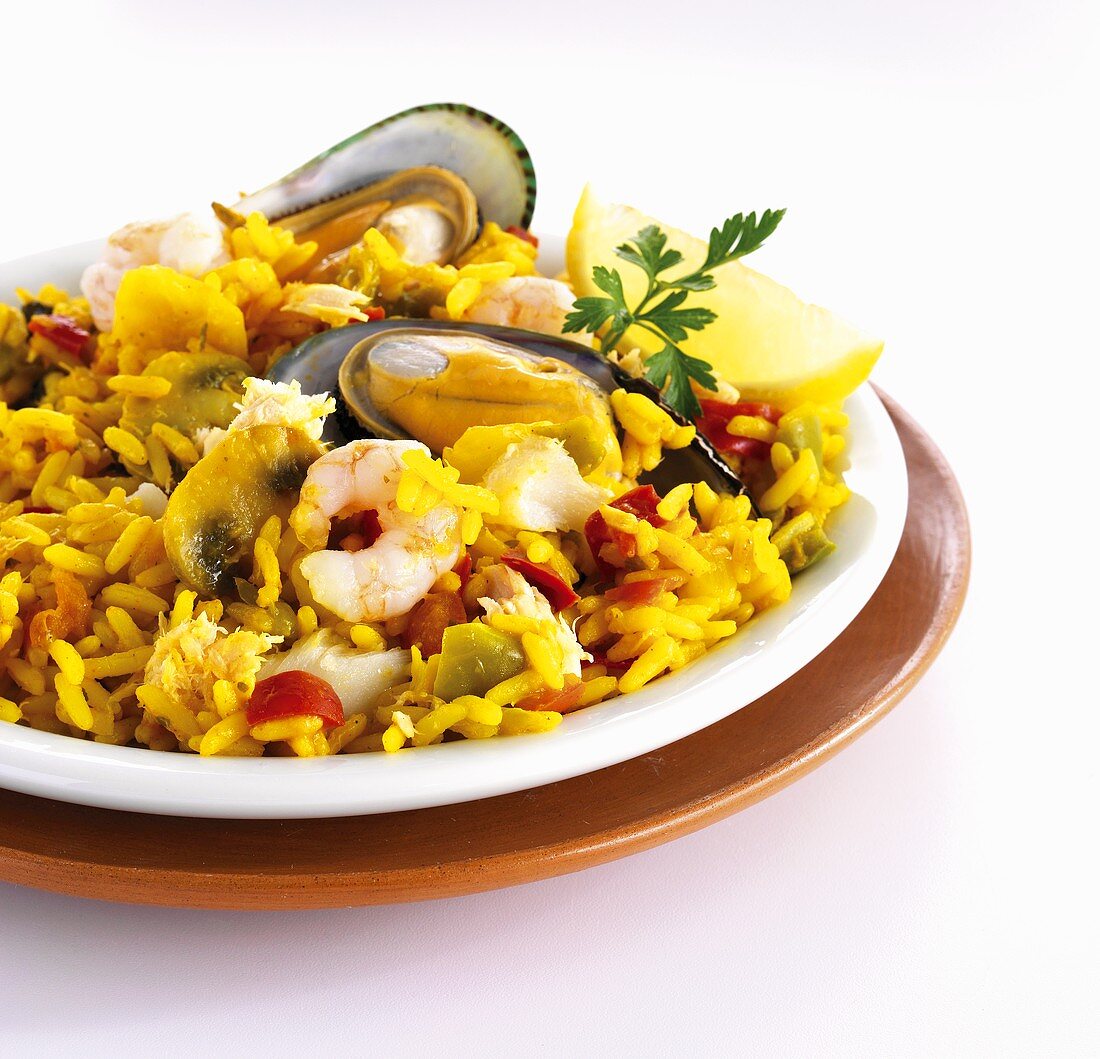 Paella with mussels, shrimp and mushrooms