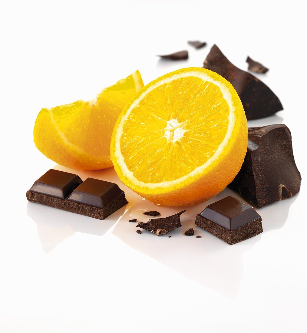An orange and pieces of chocolate