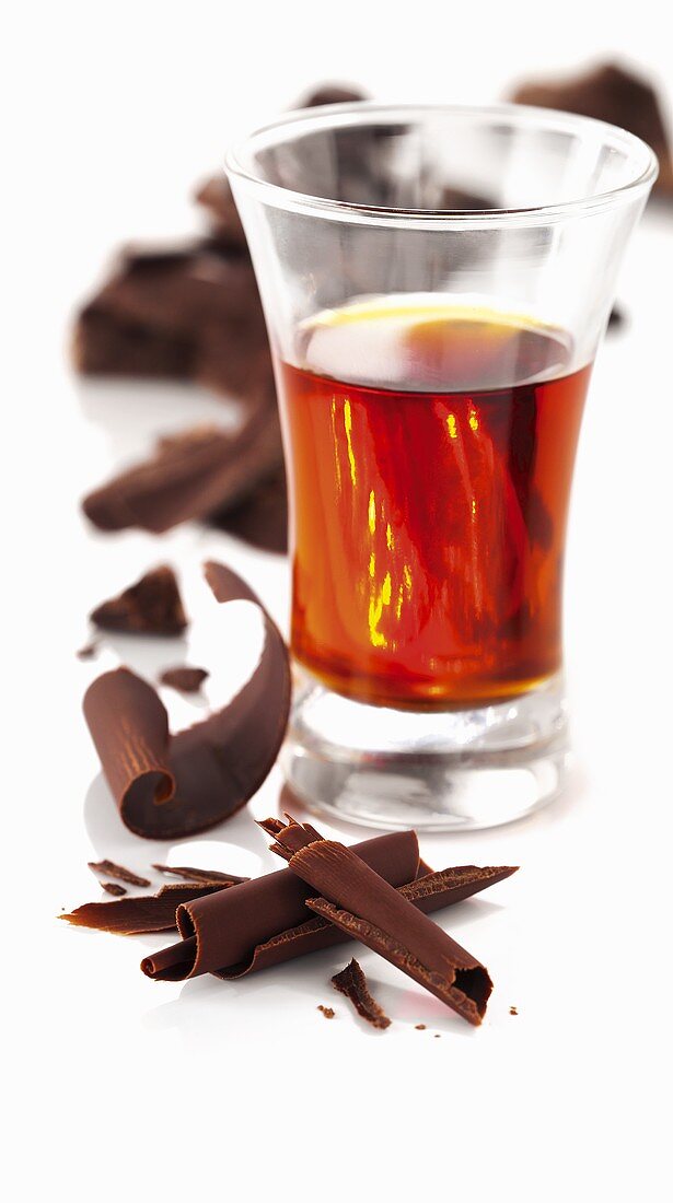Liqueur in a glass with chocolate curls