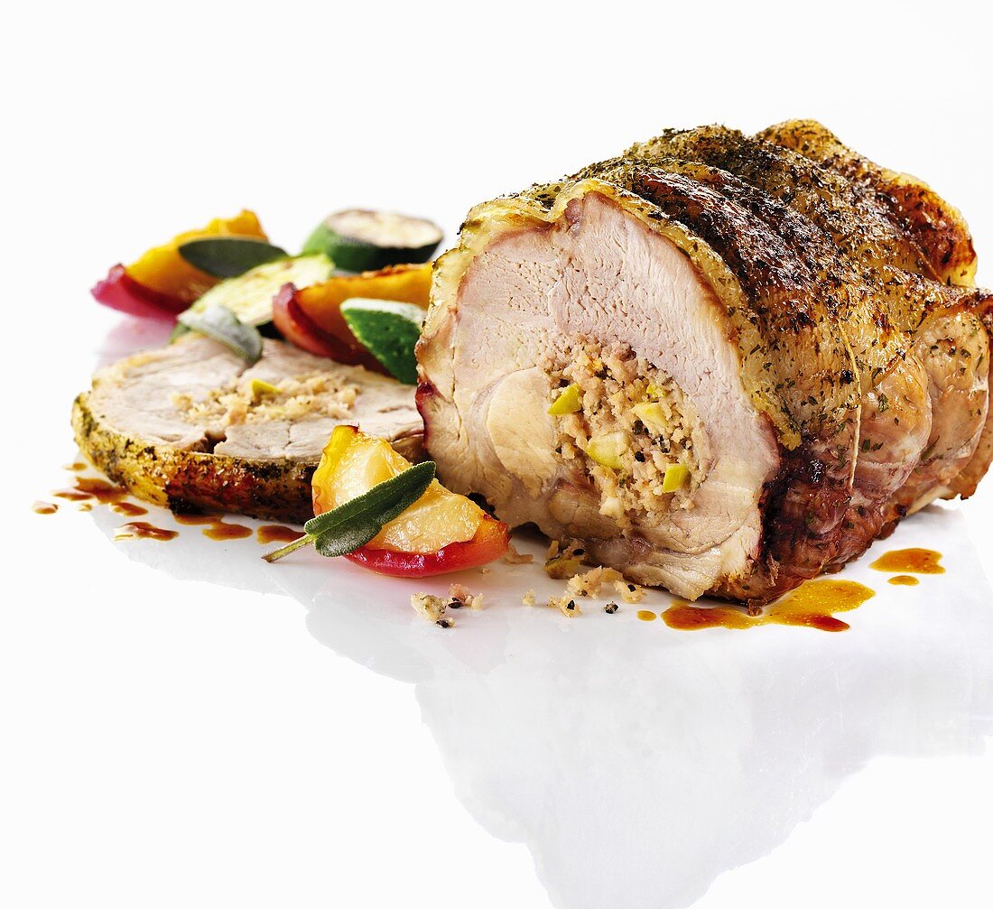 Stuffed ham with calvados, apples and vegetables