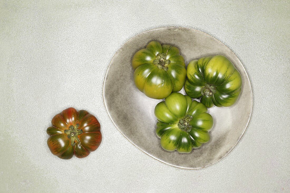 Red and green beefsteak tomatoes