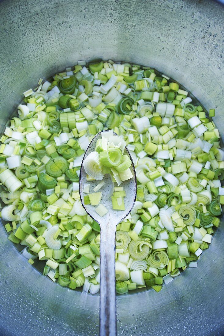 Washing Leeks; Sliced and Soaking in a Bowl of Water to Remove Dirt