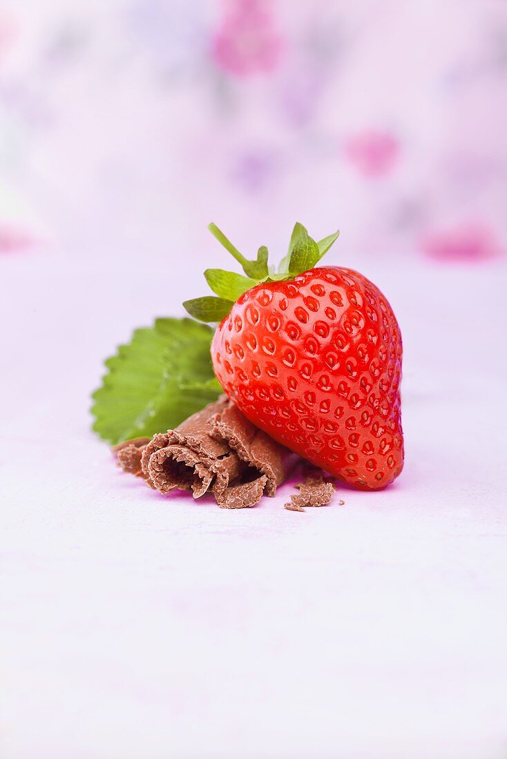 A strawberry with chocolate curls