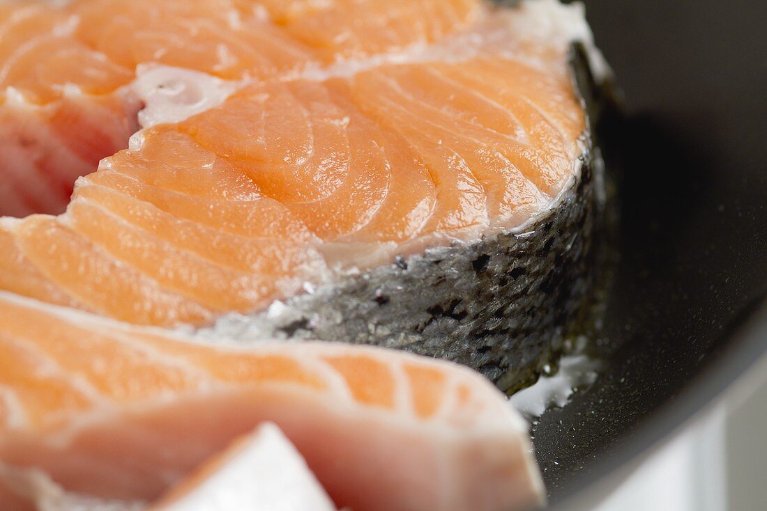 Raw salmon steaks (close-up)