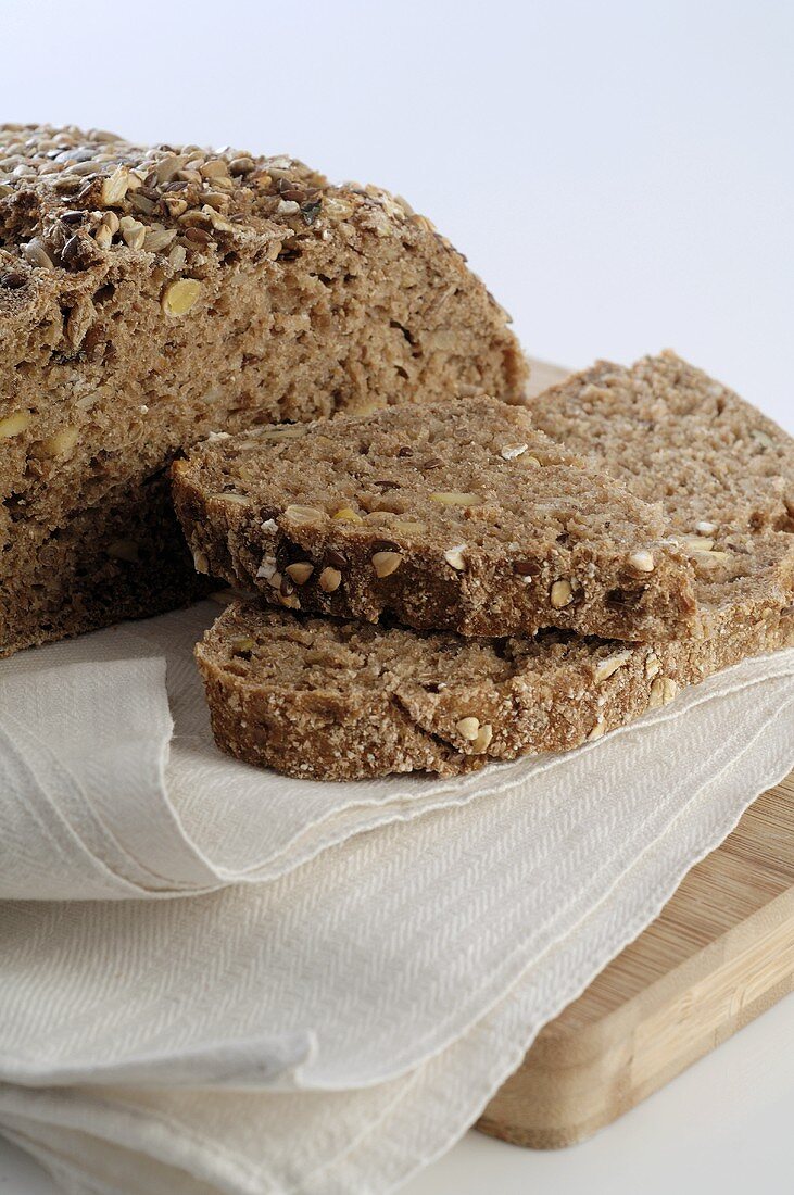 Wholegrain bread on tea towel