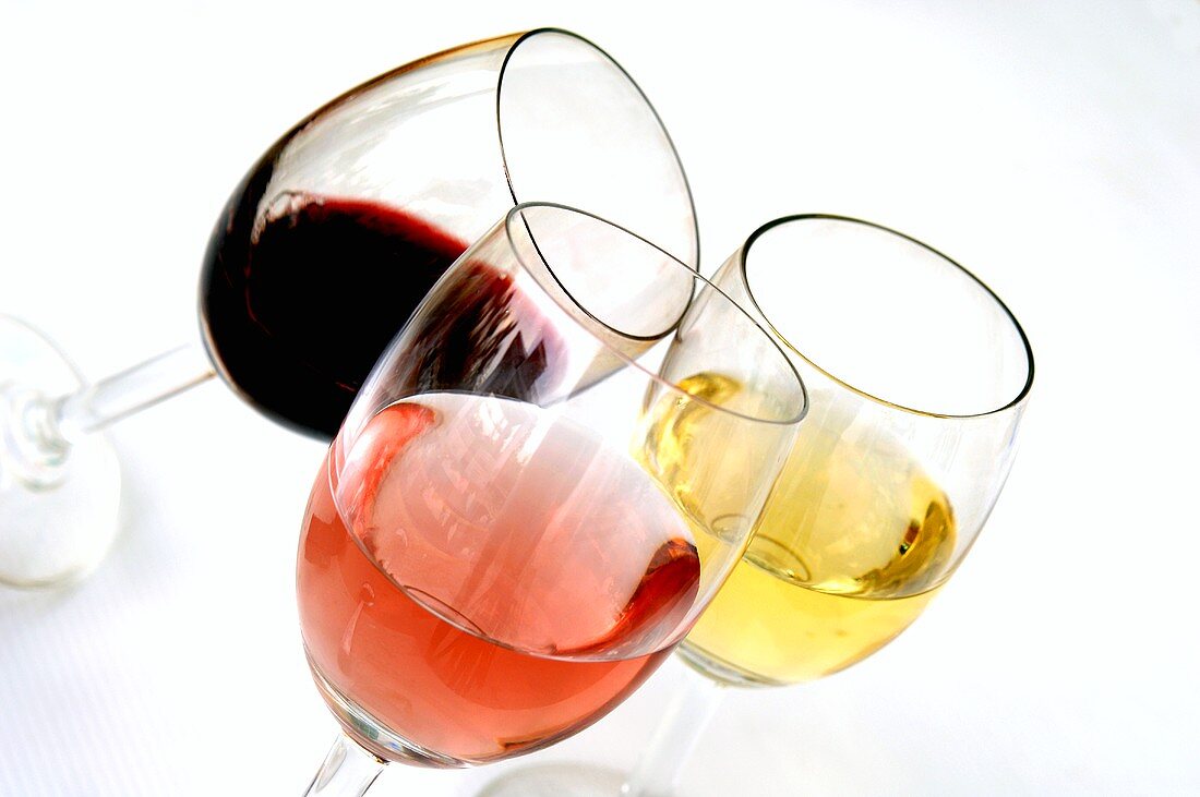 Glasses of French red, white and rosé wine (one of each)