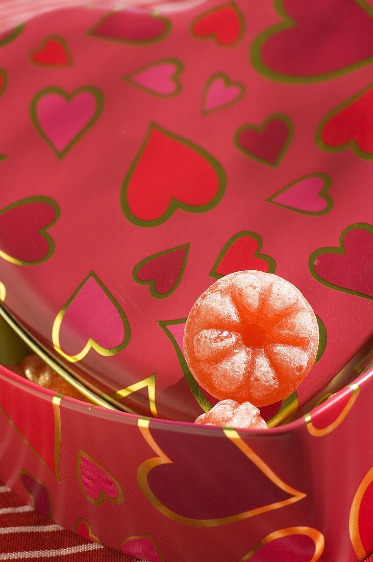 Sweets in a heart-shaped tin