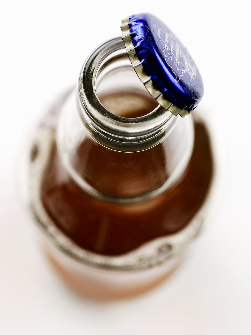 An opened bottle of ale
