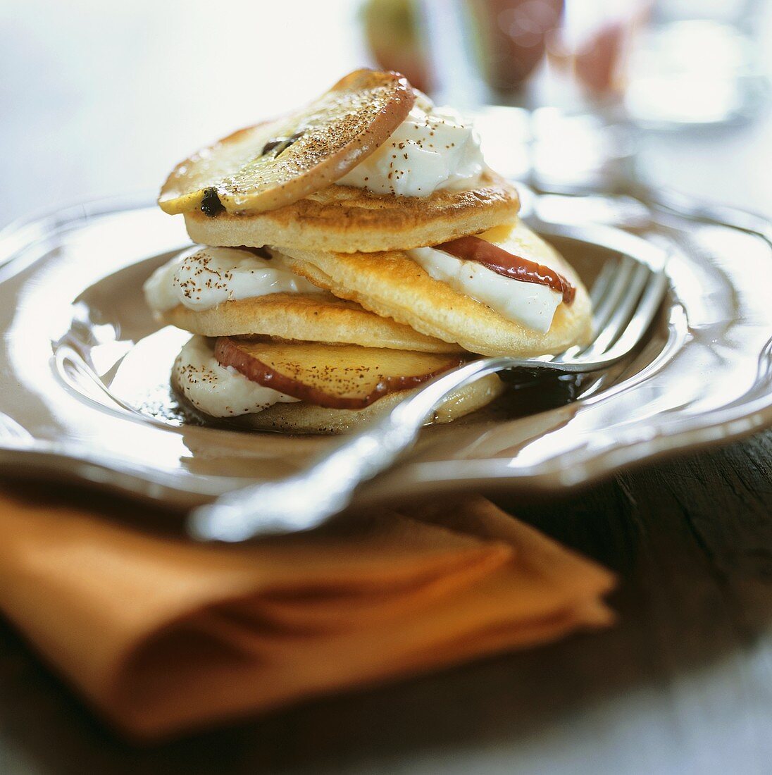 Pancakes with apple and cream