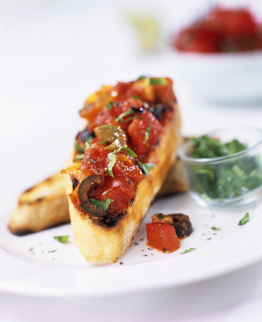 Bruschetta with tomatoes and olives