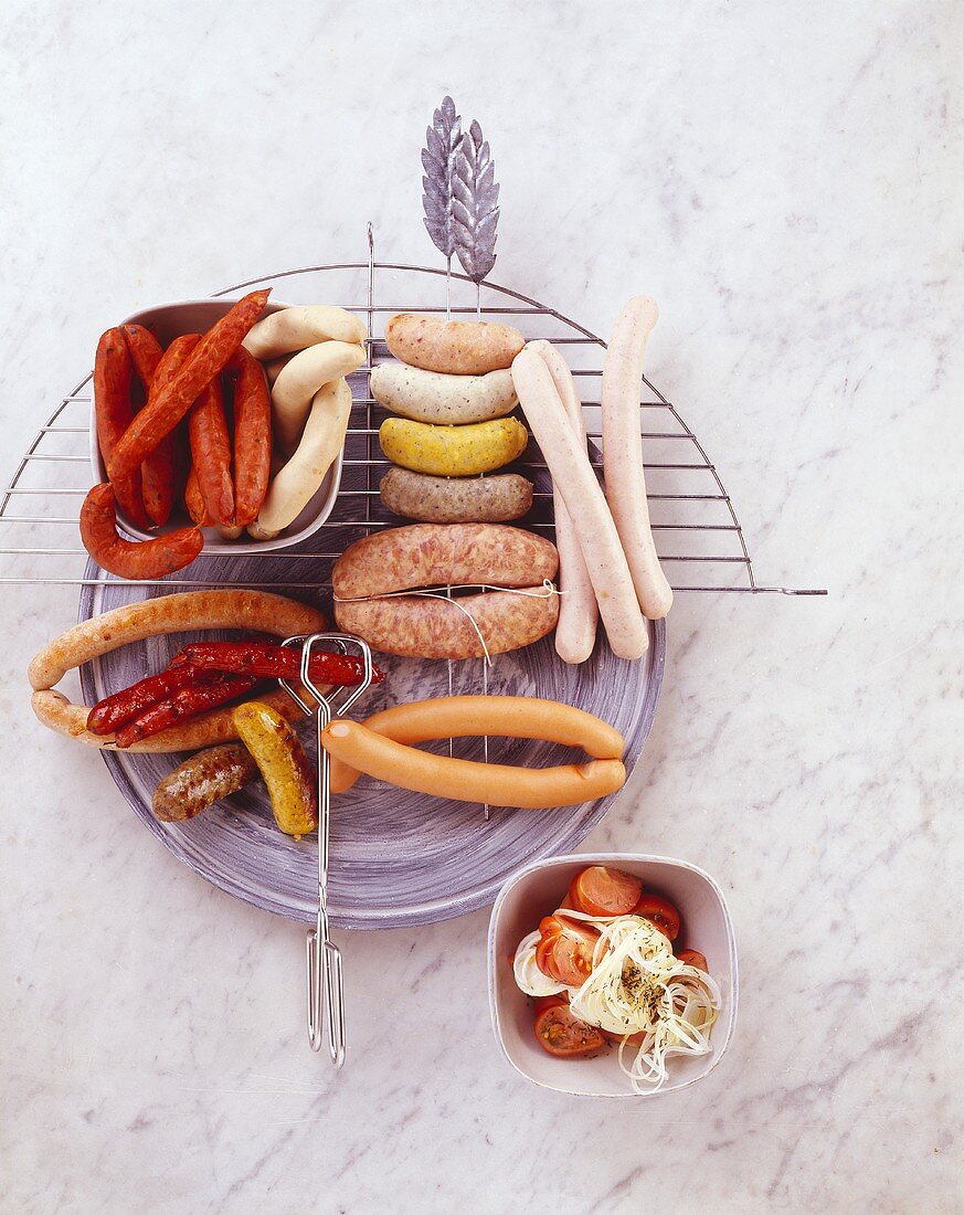 A selection of raw and grilled sausages