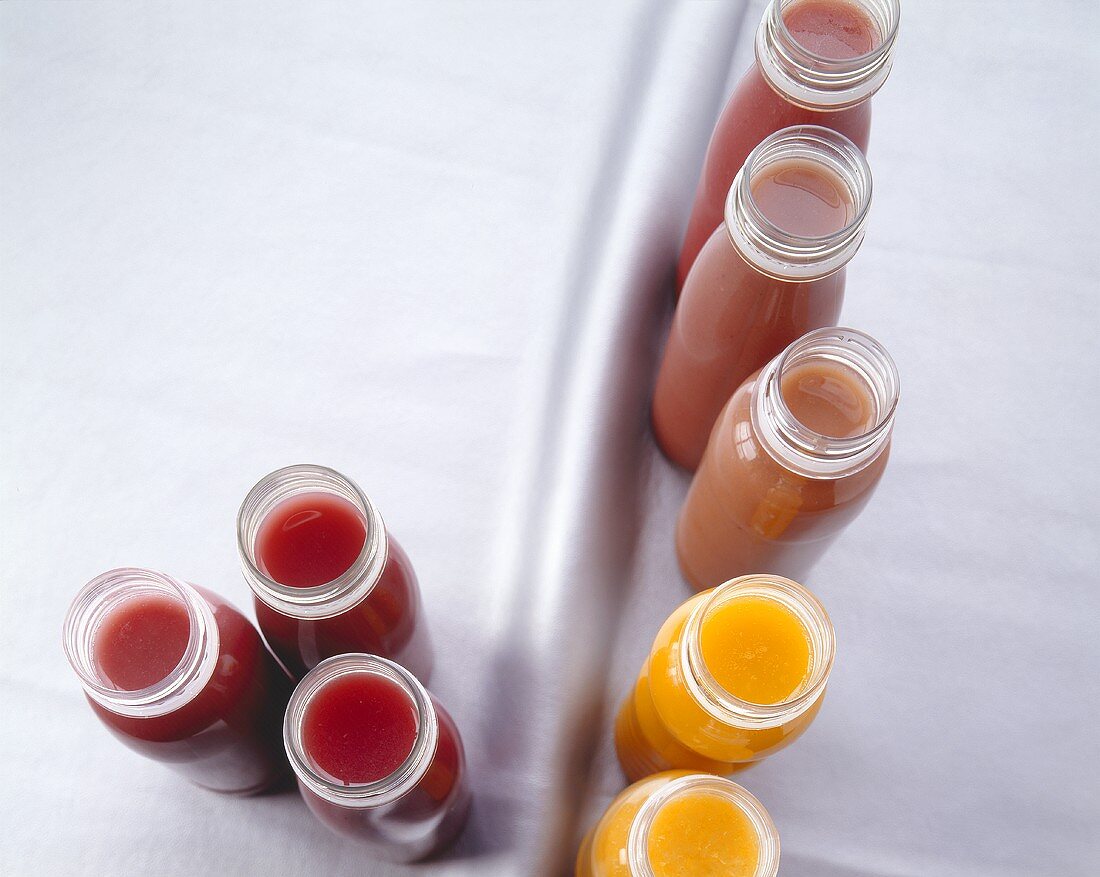 Various smoothies in plastic bottles