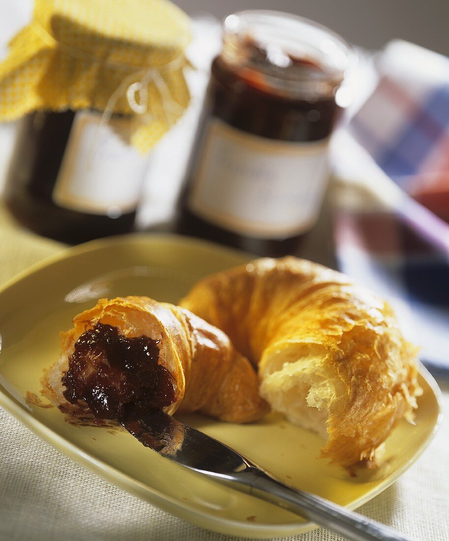 Croissant with cherry jam