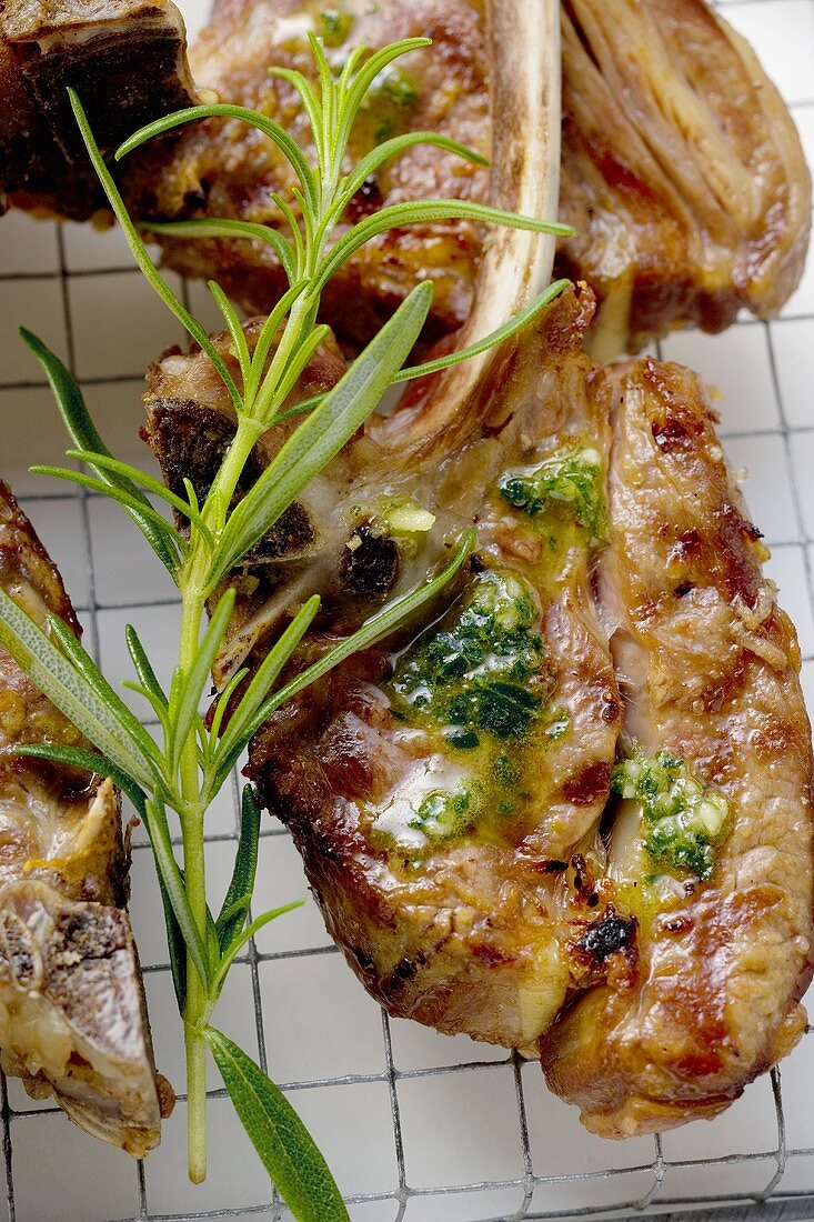 Grilled lamb cutlets with herb oil and rosemary