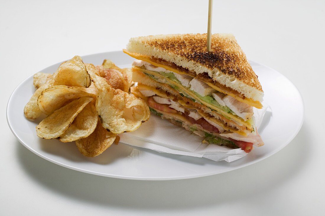 Club sandwiches, toasted, with crisps