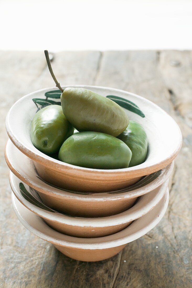 Green olives in Mediterranean bowl
