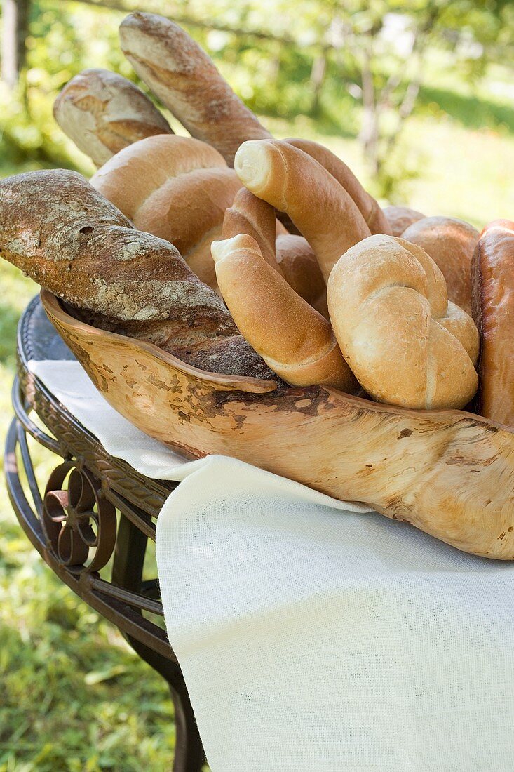 Assorted bread, bread rolls & croissants in bread basket