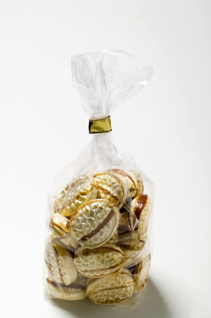 Caramel sweets in a cellophane bag