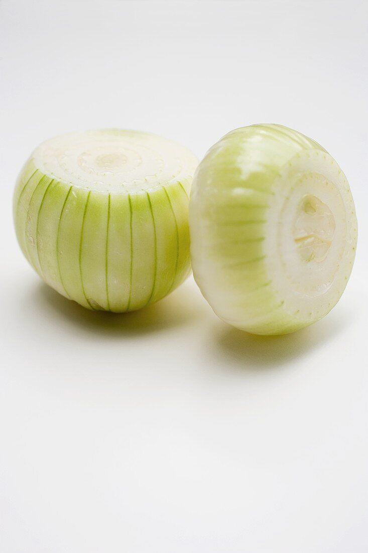 White onions with pieces cut off