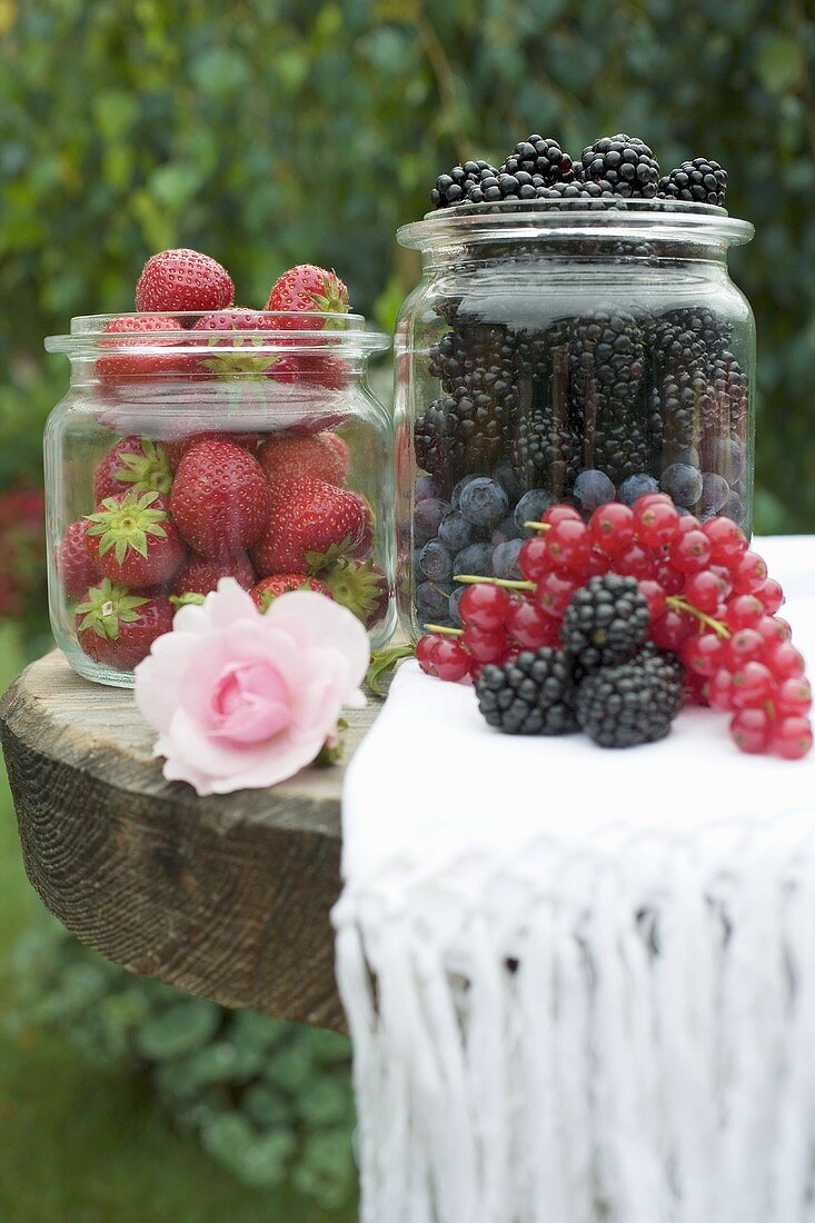 Fresh berries on table out of doors