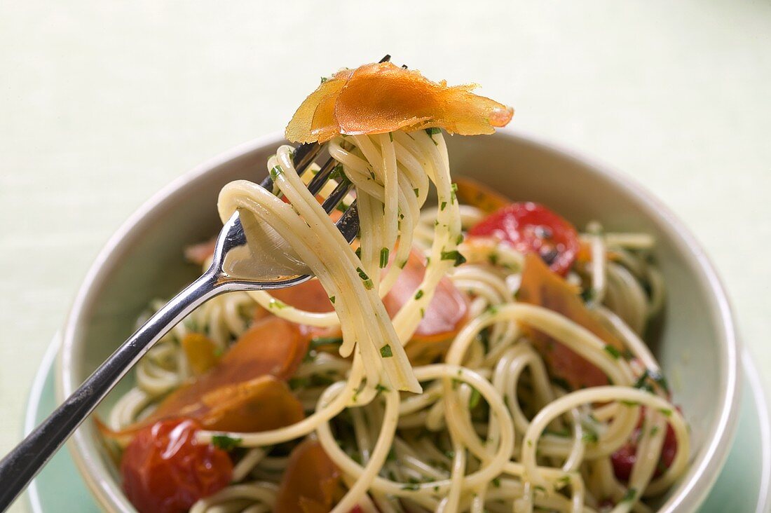 Spaghetti with bresaola and tomatoes