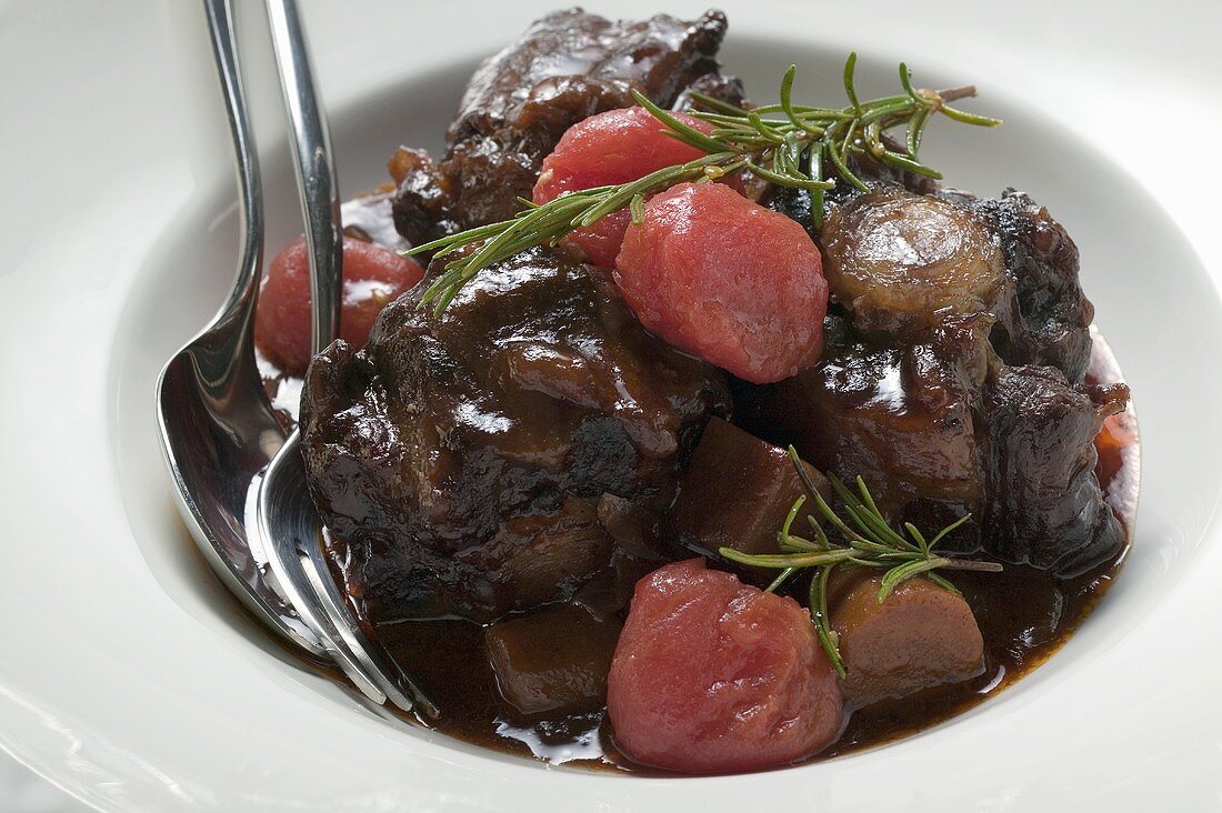 Braised oxtail with tomatoes and rosemary