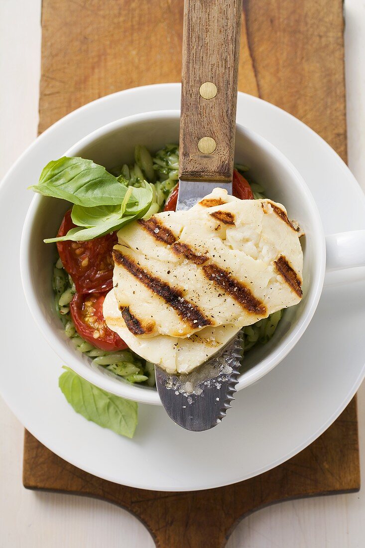 Grilled Haloumi with orzo, basil and tomatoes